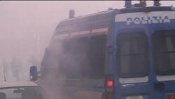 Violence at anti-capitalism demo; car burning, clashes News Clip