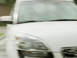 Medium shot of siblings having water fight and washing car / Pleasant Grove, Utah, United States Stock Footage
