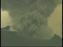 CU grey smoke and ash cloud rising quickly upwards from crater, zoom out to WA, Mount Tunguragua, Ecuador Stock Footage