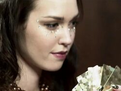 Young woman playing cards, holding royal flush Stock Footage