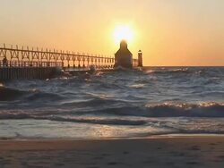 Sun Setting Behind Lighthouse Part 1 Stock Footage
