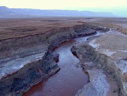   AERIAL WS TS View of muddy surface of dead sea in desert / Sourn Judea Desert, Israel  Stock Footage