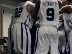 MS professional basketball team and coach in locker room running out to game / Washington, USA Stock Footage