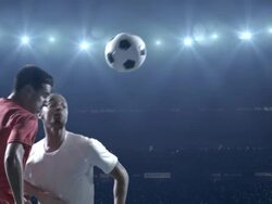 Soccer players kicking ball in stadium Stock Footage