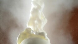 Pouring milk. Splash crown Stock Footage