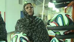 VOICED : Pakistan workers fire Brazuca ball to Brazil World Cup News Clip