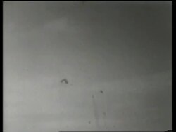 B/W airplane exploding + pieces flying thru air / air show / de Havilland Night Fighter / England / Stock Footage