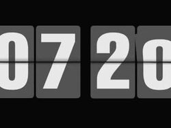 Flipping alarm clock 7-8 o'clock Stock Footage