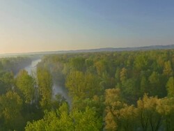 AERIAL Springtime by the river Stock Footage