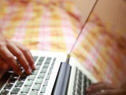 Woman using laptop Stock Footage