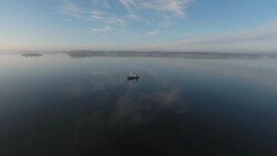 Aerial Video Boat Floating on Water Stock Footage