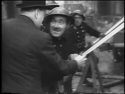 B/W 1940 Winston Churchill talking to soldiers holding hoses after German attack / London / newsreel Stock Footage