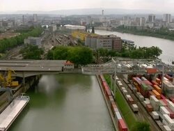 WS AERIAL View of Rhine port kleinhÃƒÂ¼ningen and rhine river with city districts basel nord and huningue, with avenue de bale, St. Johann and voltaplatz / Wadenswil, Zurich, Switzerland Stock Footage