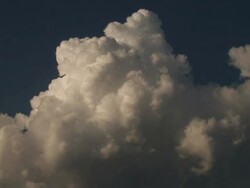 WS View of sun-lit cumulus cloud builds / Oklahoma, United States Stock Footage