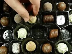 Box of Chocolates quickly disappearing. HD Stock Footage