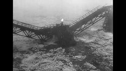 Ice-packed waters of the Vistula River smash bridges in Warsaw during spring flood News Clip