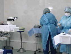 Nurses prepare equipment in operating room Stock Footage