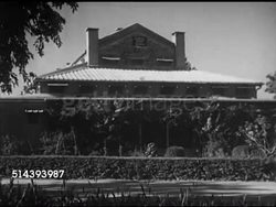 1948: BRITISH OFFICERS OFFER ADVICE: MS Sign 'Army Head Quarters [sic] Pakistan', VS British soldiers walking into building, VS Speaker at podium, audience of British Officers, Pakistani & British senior officers sitting, listening. U.N. Cease fire. Instructional Video
