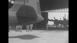 US warplanes in hangars on a stop en route to USSR as part of Lend-Lease News Clip