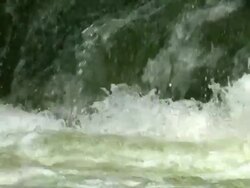 CU Shot of rushing white water river with water splashing / Galilee, Israel Stock Footage