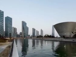 WS T/L View of Nightscape of Songdo International Business District(a new Smart City or Ubiquitous City of Korea) along the river / Seoul, South Korea Stock Footage