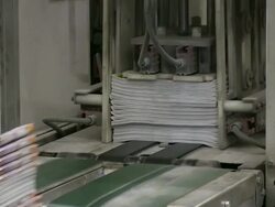 CU Magazines passing on conveyor belt in gravure printing office / Itzehoe, Schleswig-Holstein, Germany  Stock Footage