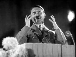 B/W 1940s Adolf Hitler giving impassioned speech / educational Stock Footage
