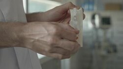 Doctor opening a insulin syringe at the hospital Stock Footage