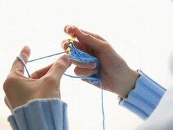 MS Woman Knitting with blue wool / Shibuya-ku, Tokyo, Japan Stock Footage