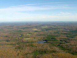 MS AERIAL ZO View of light house and towers on mountain at Savoy Mountain State Park / Massachusetts, United States Stock Footage