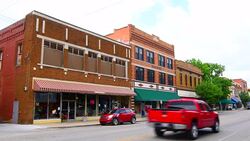 Sapulpa Oklahoma Route 66 town main street called Dewey Street with Route 66 signage get your kicks on Route 66 Stock Footage