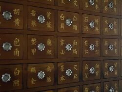 Medicinal herbs cabinet at the oriental medical clinic Stock Footage