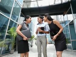 Three business women talking  Stock Footage
