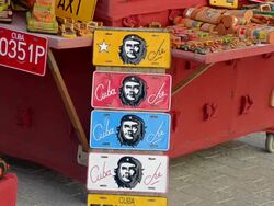 CU Shot of trinidad cuba close up of license plates of hero che guevara for sale in market / Trinidad, Cuba Stock Footage