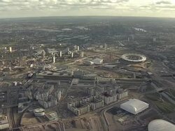 Aerial overhead tracking W/S  Olympic Park under construction Stock Footage