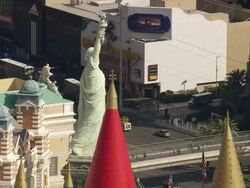 MS AERIAL ZO View of Hotel, modal of statue of liberty with traffic Las Vegas / Nevada, United States Stock Footage