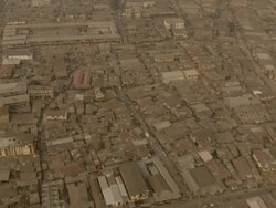 WS AERIAL ZI View of houses and yellow cabs / Lagos, Nigeria Stock Footage
