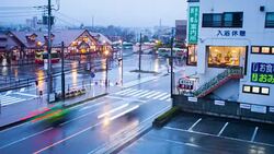 Time lapse of Kawaguchi station while raining at night Stock Footage