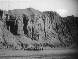 Afghanistan 1945 - Hindu Kush mountains, Bamiyan Valley, Buddhas of Bamiyan, street scenes in Kabul and the Bala Hissar fortress. Stock Footage