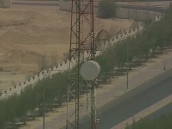WS AERIAL ZI ZO Shot of mobile tower in city / Qatar Stock Footage