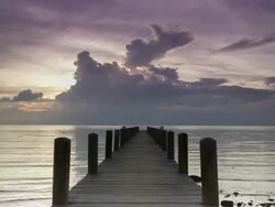 Time lapse sunset by the pier Stock Footage