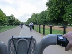 POV WS Hire bike riding through Hyde Park London Stock Footage