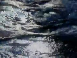 HD Sunlight Reflecting Icy River Close-up (4:2:2@100 Mb/s) Stock Footage