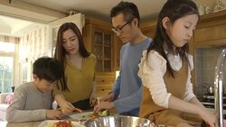 Little helpers at dinner time Stock Footage
