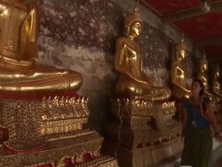 MS DS Young couple walking at Wat Phra Kaew (Temple of the Emerald Buddha), Bangkok, Thailand Stock Footage
