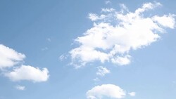 Plane Flying Passing Through Clouds in the Blue Sky Stock Footage