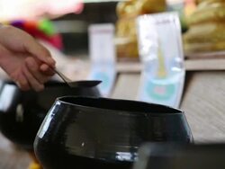 merit rice in temple Stock Footage