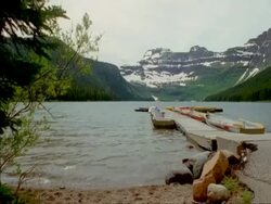 WA scenic view of boats on jetty, Cameron lake, Waterton national park, Alberta, Canada Stock Footage