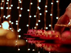 Young woman burning candles Stock Footage