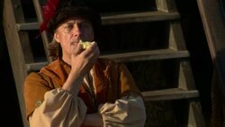 Christopher Columbus eats fruit on a ship's deck. Stock Footage